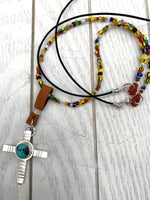 Changing cross necklace